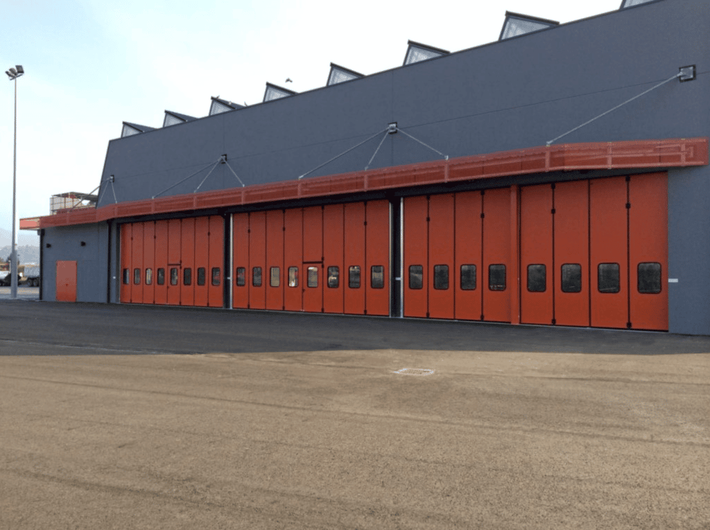 Portone industriale a libro: Perchè è importante averne uno installato?